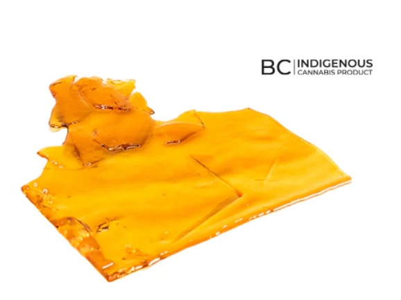 Golden cannabis shatter concentrate from Eggs Canna 