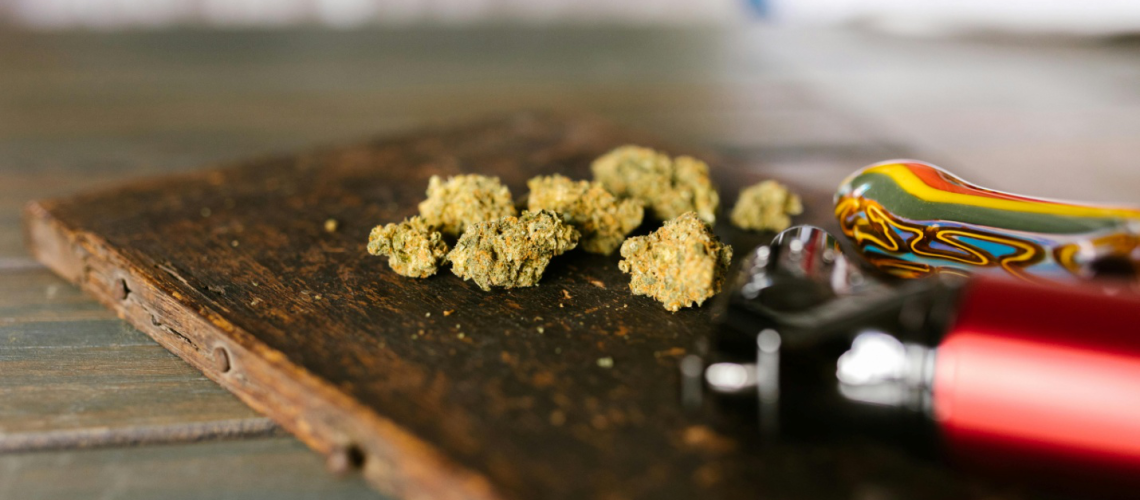 dried kush on a wooden board